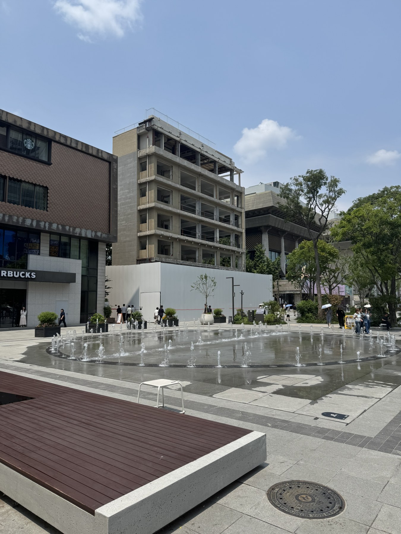 Building skeleton on Gwanghwamun Plaza photographed in July 2026